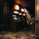 A small rocket on a launch rail in a dark amusement hall, with a warmly glowing arcade machine behind it