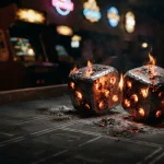 Smouldering metal dice on a dark casino table, with warm neon reflections and a softly lit arcade cabinet behind
