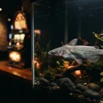 A lifelike catfish gliding through a dramatically lit aquarium beside a softly glowing casino arcade cabinet