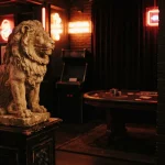 A sculpted stone lion beside a warmly lit arcade cabinet in a dark cinematic gaming lounge