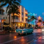 Neon-lit Miami seafront with pastel Art Deco buildings, palms and a small slot machine in a lounge window
